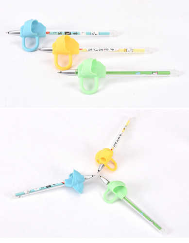 Children's three-finger pen grip corrector silicone pencil holder commonly used for primary school students and children's stationery manufacturers supply