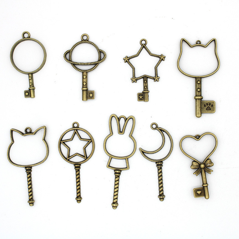 Wholesale alloy frame UV crystal drop glue model key shape diy jewelry accessories hollow opening frame