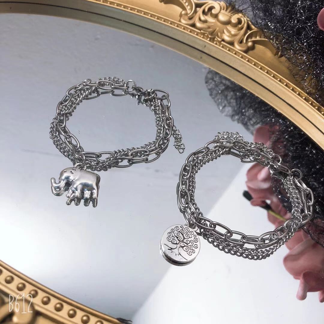 Collana multiraggio con ciondolo albero della vita in acciaio_voghion.com