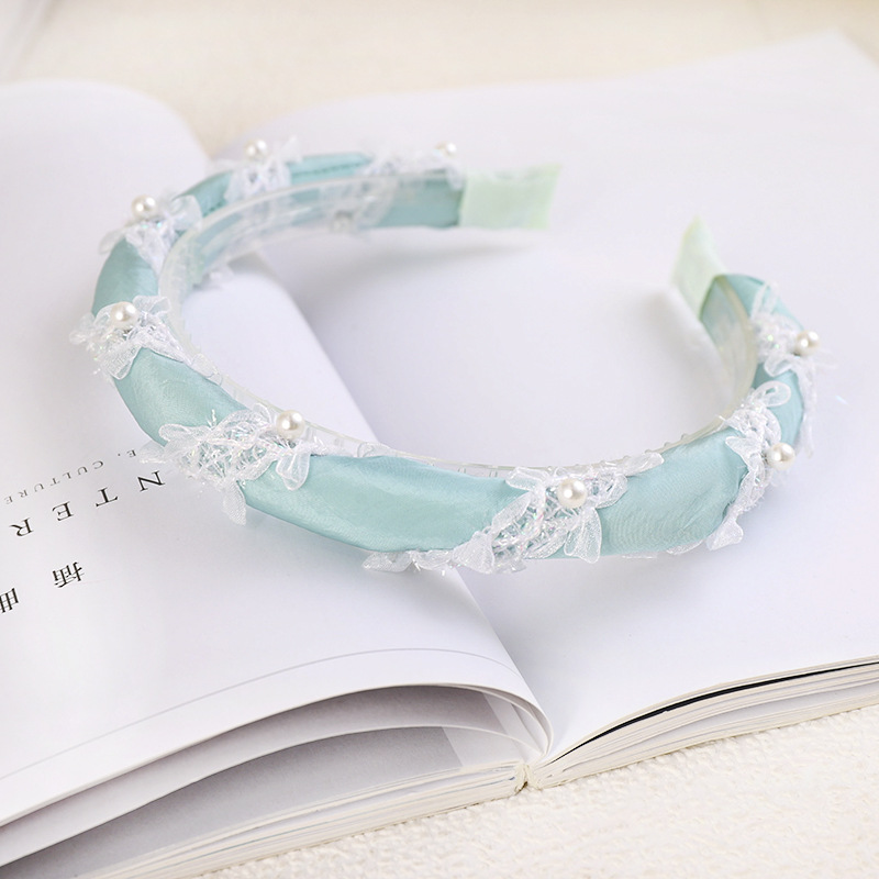 Korean Pearl Winding Lace Headband Cloth Pearl Headband Pure Color Cloth Toothed Headband Wholesale Nihaojewelry display picture 13