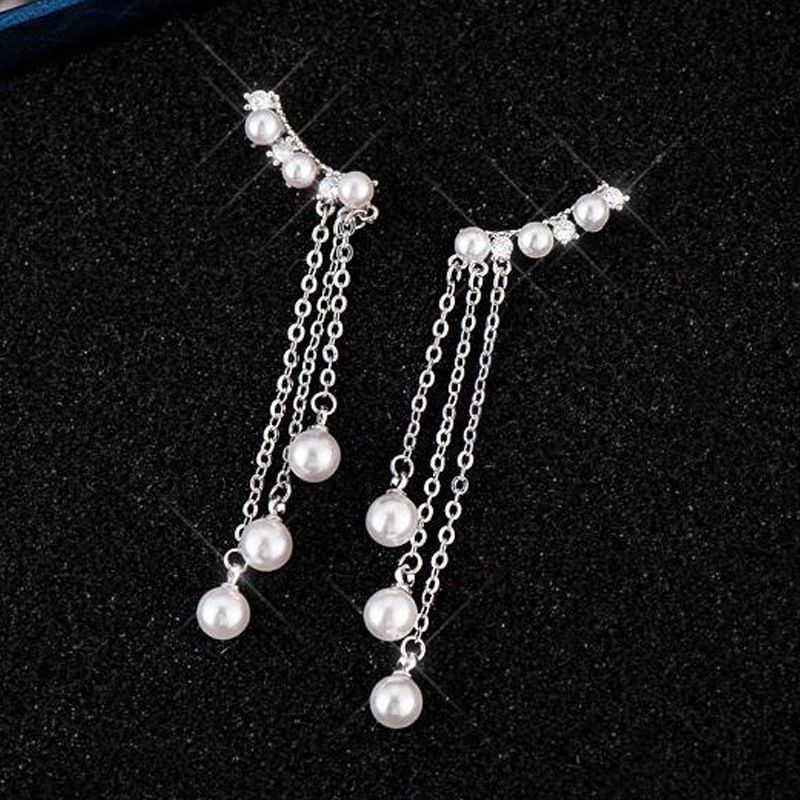 Elegant long earrings with tassels from pearl