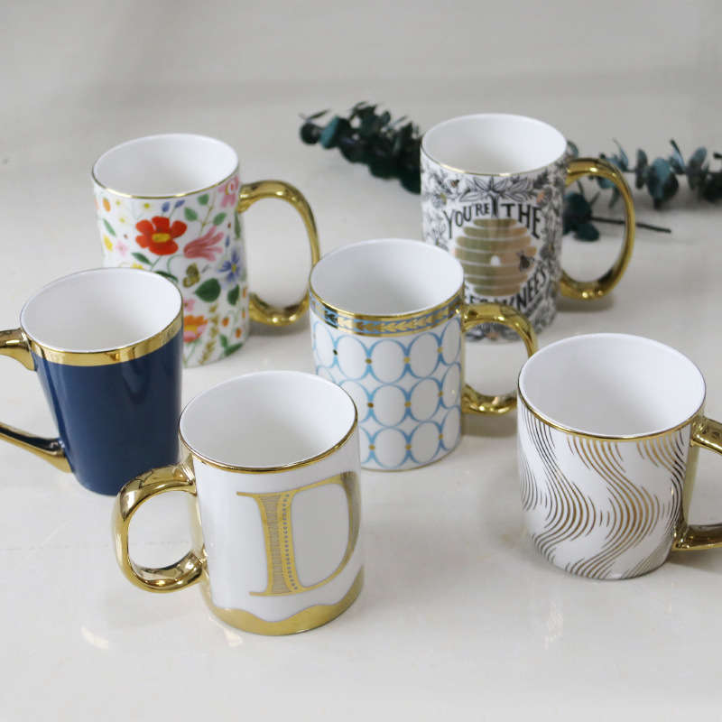 Mug customized electroplate White porcelain cup Outline in gold High-end Water cup Milk Cup originality Ceramic cup Customize LOGO