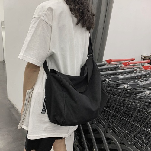 韩版春夏大容量帆布斜跨包校园学生纯色文艺日系慵懒风闺蜜大布包
