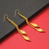 Golden jewelry for bride, long earrings with tassels, 24 carat