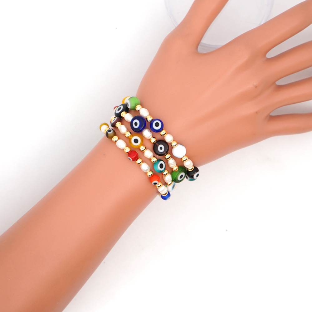 New Simple Baroque Pearl Glazed Evil Eye Ethnic Style Gold Bead Bracelet For Women Wholesale display picture 21