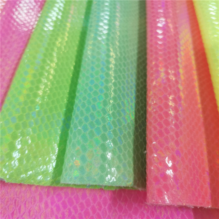 廠家直銷專業生産加工複合壓紋熒光燙金布料時尚玩具裝飾面料