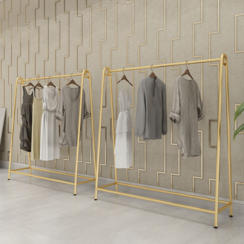 Fashionable floor-standing iron rack for clothing store, gold-colored women's clothing hanger island display rack wholesale