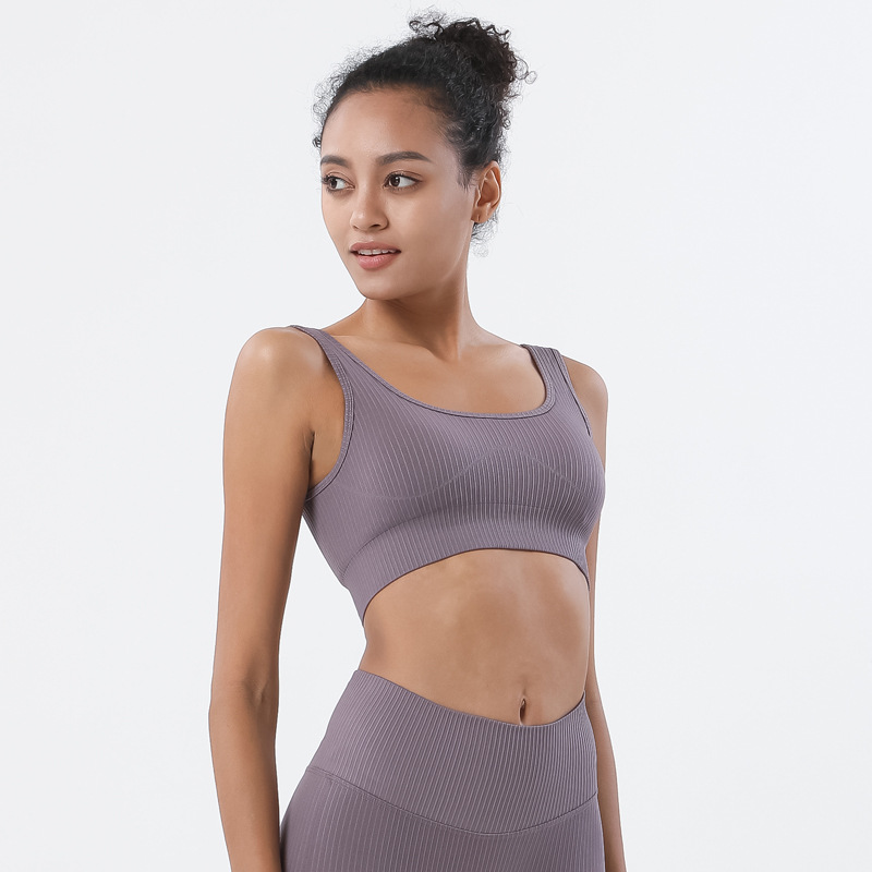 Europa y América Amazon Venta caliente de punto sin costura traje de nylon de secado rápido traje de yoga traje chaleco mujeres