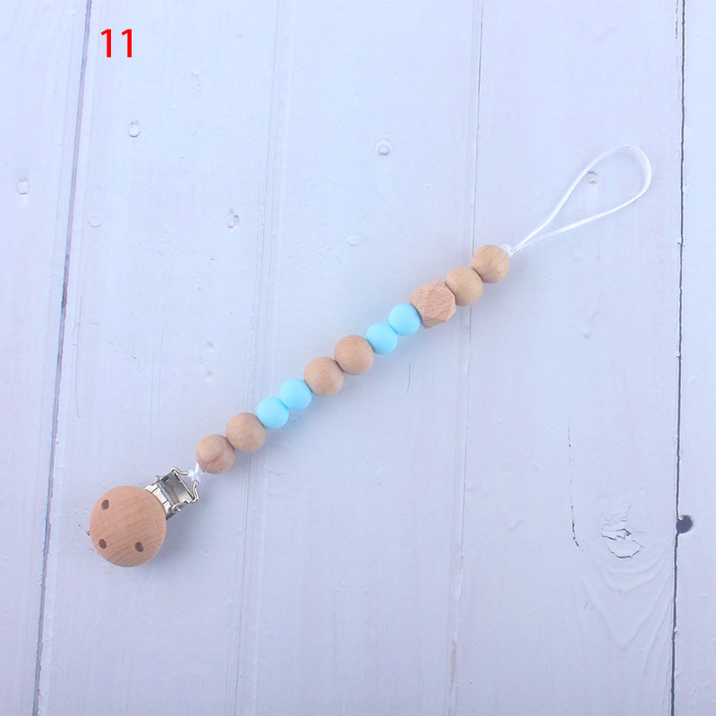 Nueva fábrica directa bebé Beech juguete mordedor bebé chupete de silicona pezón anti-gota cadena materna y infantil suministros