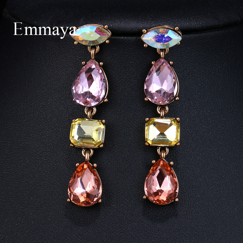Fashionable elegant earrings drop-shaped with zircon