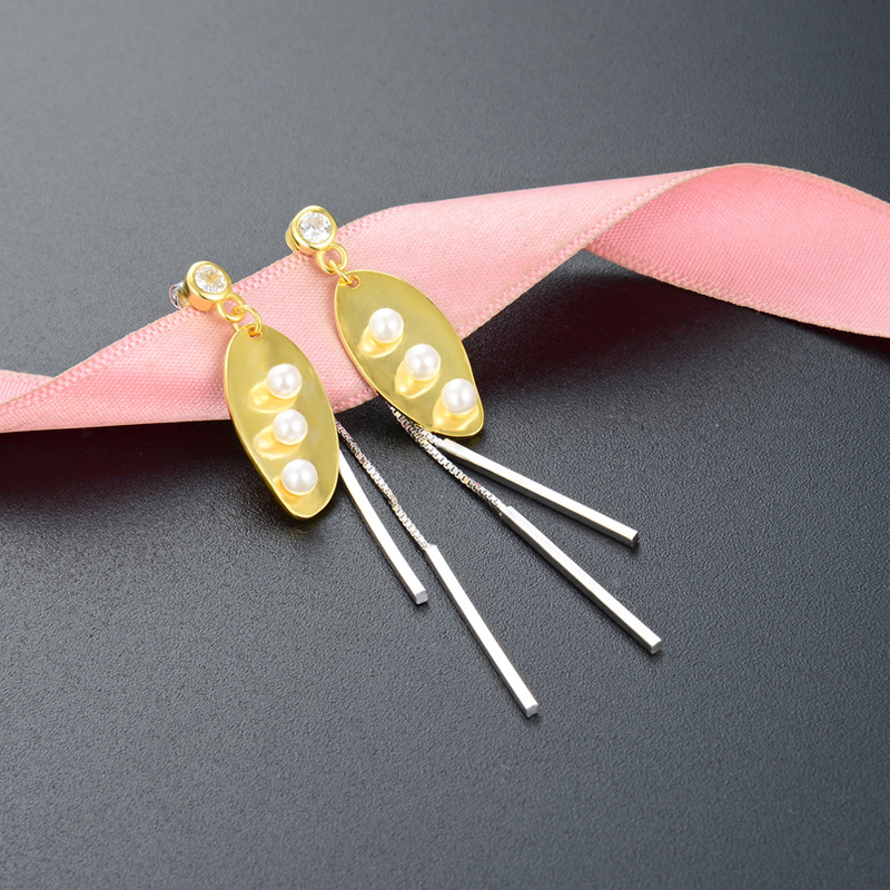 Chapado en oro hoja larga s925 pendientes de plata elegante temperamento Super Hada moda femenina pendientes fuente de fábrica al por mayor