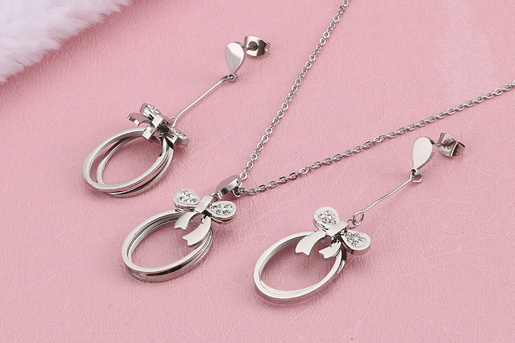 Japanese and Korean New Fresh Fashion Titanium Steel Bow Geometric Hollow Necklace Earrings Womenu00
