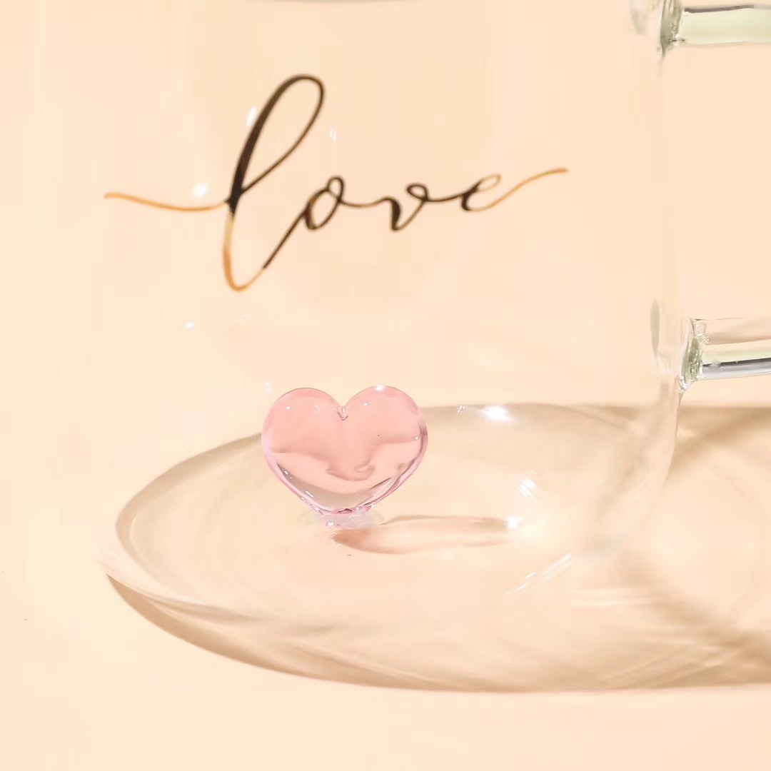 Personalidad creativa pareja de vidrio transparente taza de agua con tapa cuchara taza resistente a altas temperaturas melocotón corazón tridimensional niña taza