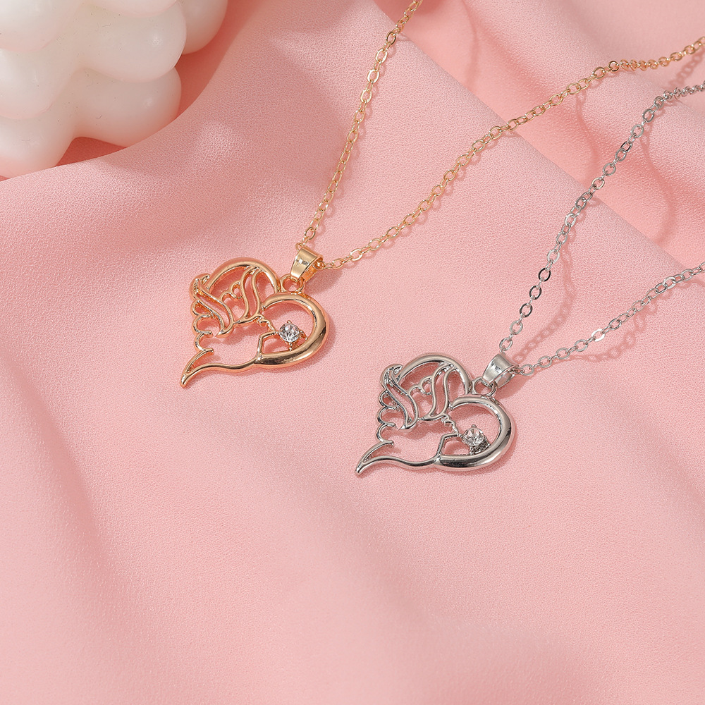 Creative Hollow Heart-shaped Peace Dove Diamond Animal Necklace display picture 4