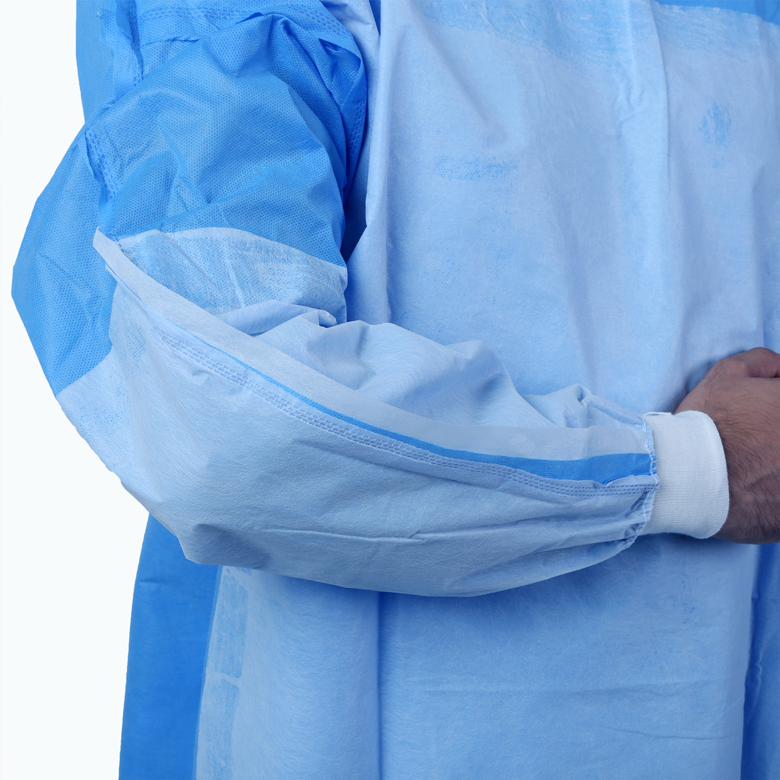 蓝色SMS无纺布连体防尘服针织橡筋袖口线缝热合手术衣