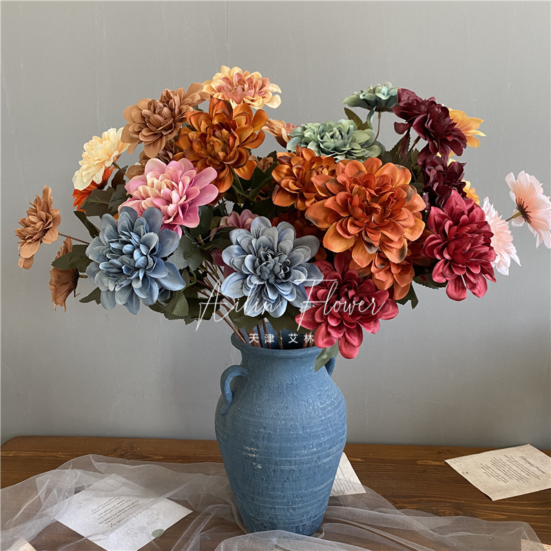 3 autumn colorful flowers