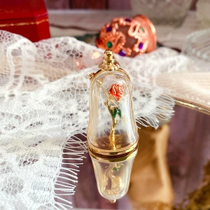 Qingdao factory new wholesale magic bottle rose drop oil enamel resin retro French style women's brooch pin