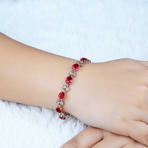 Hollow four-leaf clover bracelet, flower full diamond live ring, rose crystal earrings, simulated ruby ​​tourmaline clavicle chain