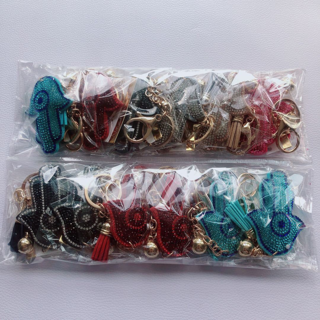 Venta caliente transfronteriza de Palma llavero coreano terciopelo rhinestone gato ojo llavero bolsa colgante accesorios en stock