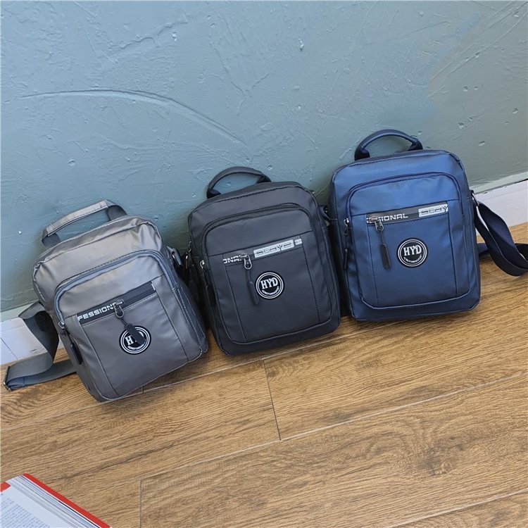 男士斜挎包休閑男包多功能胸包單肩包斜跨小背包潮牌包包