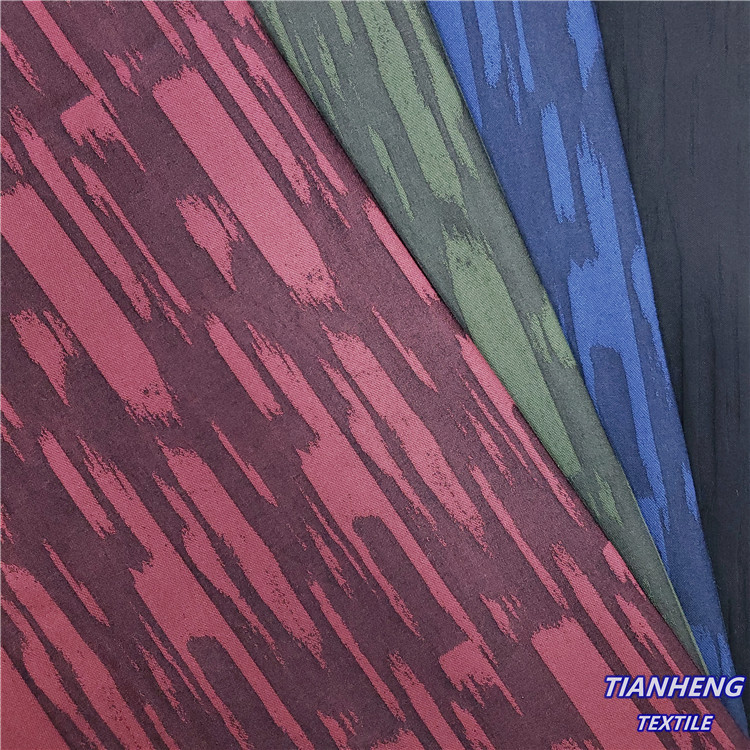 时尚男女装裤装西装外套连衣裙箱包涤棉条纹罗缎提花面料现货批发