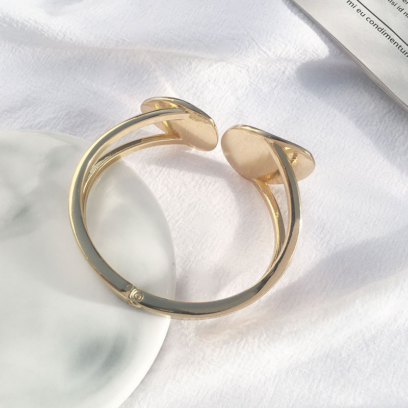 Hollow Asymmetrical Oval Alloy Open Bracelet