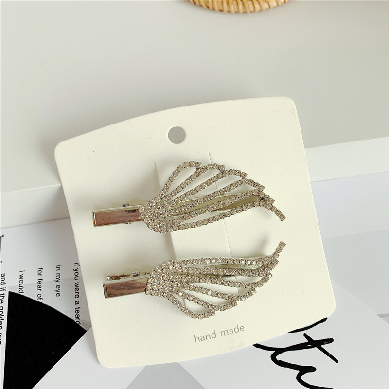 Corée Du Sud Nouvelle Pleine Diamant Personnalité Petites Ailes Strass En Épingle À Cheveux Mot Clip Côté Clip Tempérament Coiffure En Gros Nihaojewelry display picture 4