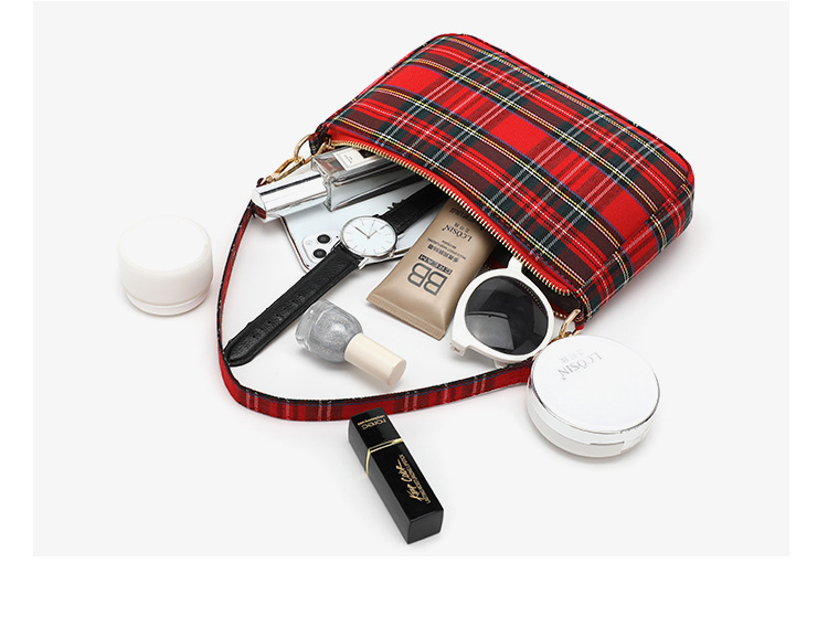 Damestassen 2023 Koreaanse versie van de nieuwe internetberoemdheid geruite baguette okseltas canvas tas literaire retro cross-body schoudertas_voghion.com