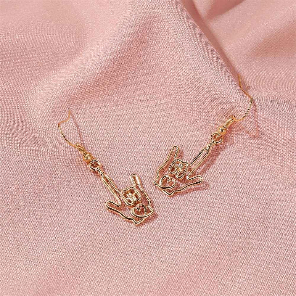 Nouvelles Boucles D'oreilles Simples Boucles D'oreilles Geste Creux Dames Aiment Palm Pendentif Boucles D'oreilles En Gros Nihaojewelry display picture 5