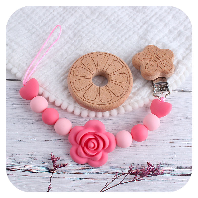 Nueva Flor de dibujos animados chupete clip de juguete de haya mordedor bebé de silicona Rosa corona chupete cadena anti-gota cadena
