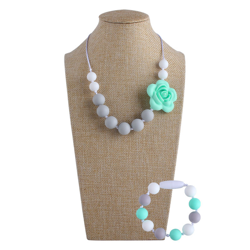 Venta caliente forma de Rosa collar de silicona mordedor masticable colgante infantil molar mordedor de silicona pulsera de cuentas