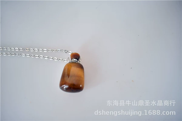 Tiger eye stone bottle