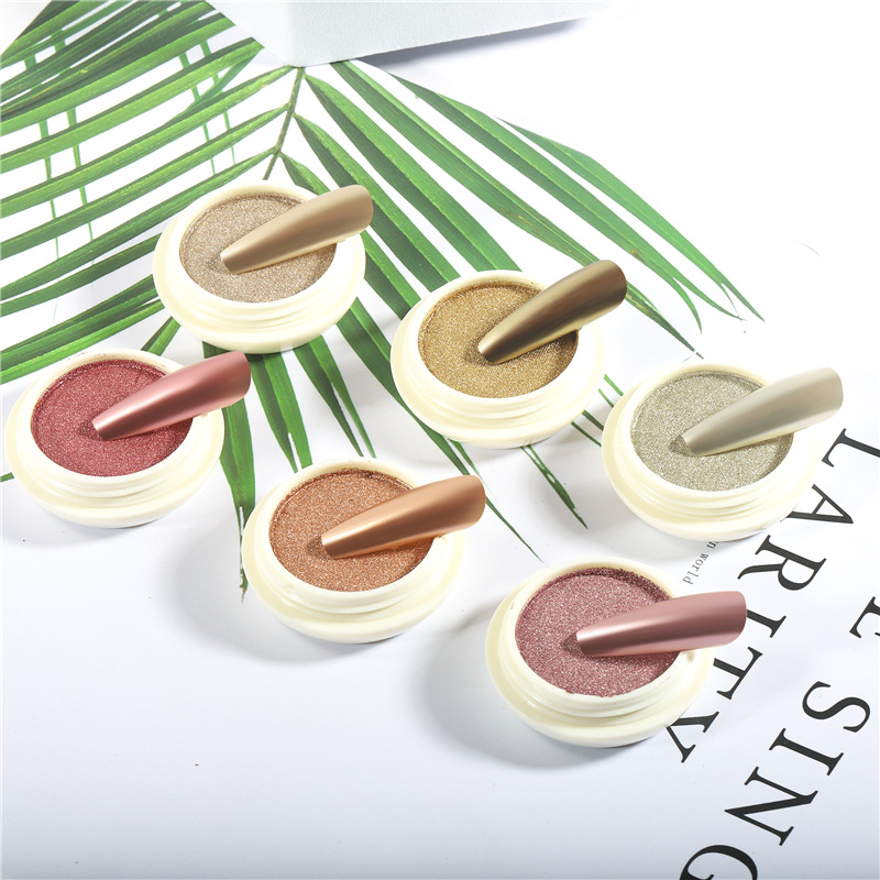 Polvo de espejo mágico sólido de uñas nuevo transfronterizo Espejo mágico de 6 colores Polvo de oro de lujo sólido Espejo mágico Polvo de oro de titanio súper brillante