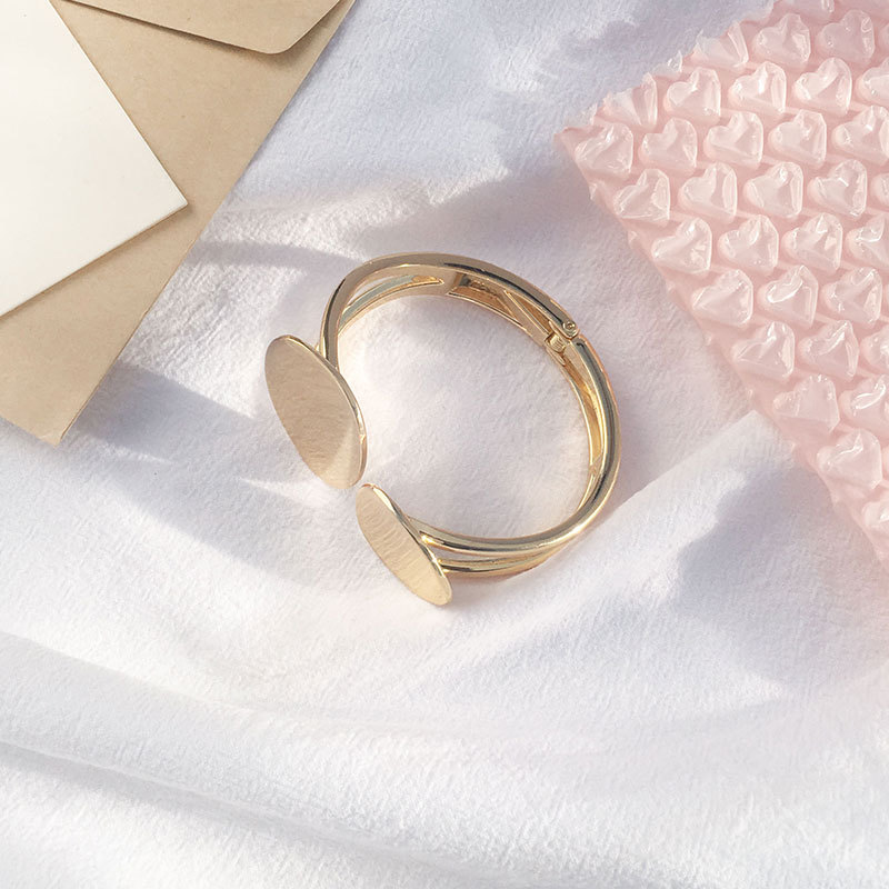 Hollow Asymmetrical Oval Alloy Open Bracelet