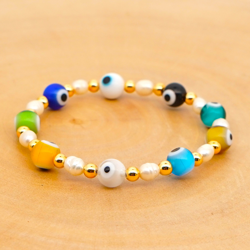 New Simple Baroque Pearl Glazed Evil Eye Ethnic Style Gold Bead Bracelet For Women Wholesale display picture 4