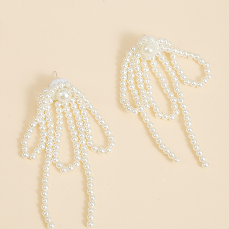 Korean Temperament Hand-woven Pearl Tassel Earrings Personality Long Earrings Jewelry Wholesale Nihaojewelry display picture 8