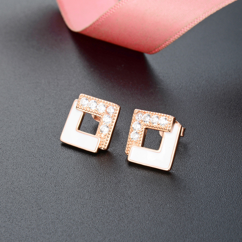 Versión Coreana de s925 plata ZIRCON pendientes mujeres japonesas temperamento aceite goteo Stud costura Rhombus pendientes
