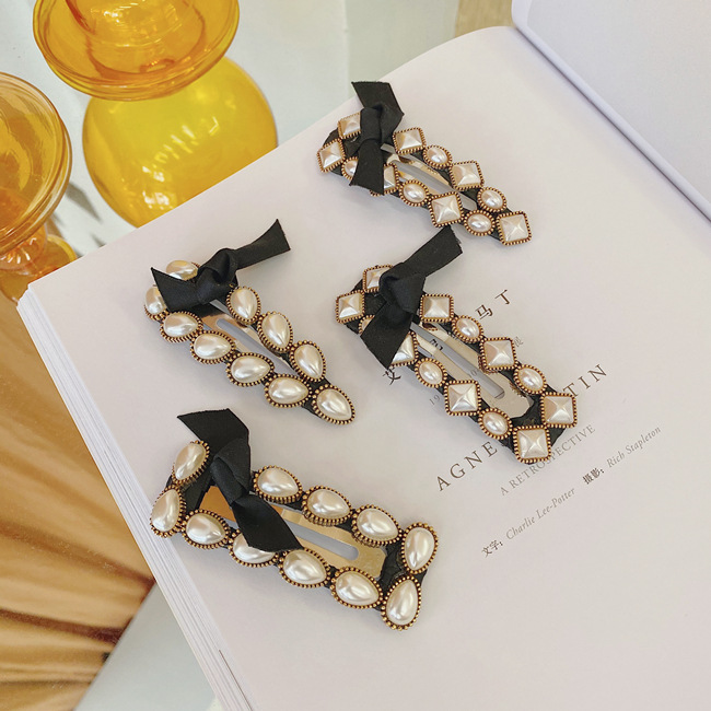 Pearl Bow Knot Korean Fashion Alloy Hair Clip Back Head Hairpin Women's Side Clip Wholesale display picture 6