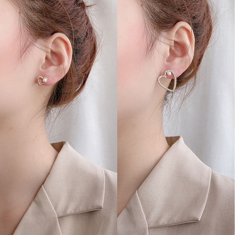 925 Silver Needle Asymmetric Love Pearl Small And Simple Earrings For Women display picture 1