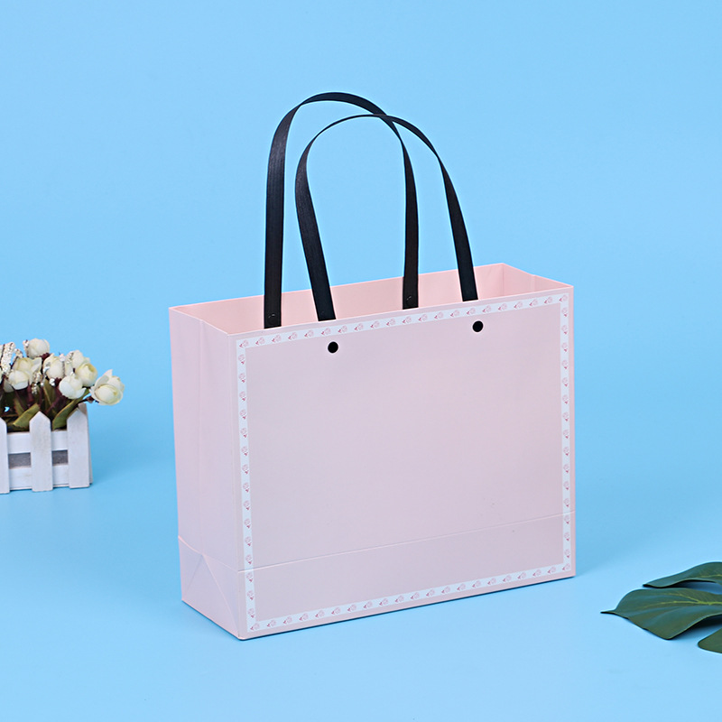 厂家批发企业广告礼品袋子购物包装纸袋粉色简约手提纸袋可加logo