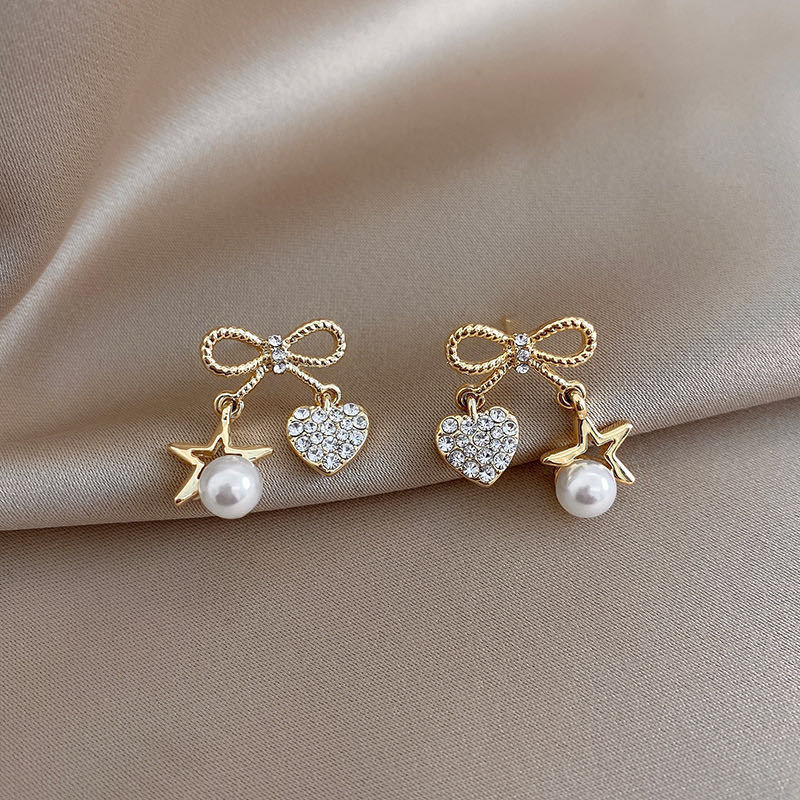 925 Silver Needle Bowknot Pearl Diamond Earrings display picture 5