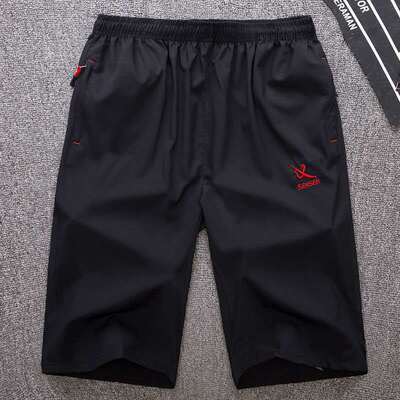 Manufactor wholesale Thin section man black Quick drying shorts Sandy beach Sunscreen Seventh Pants Large Add fertilizer motion Elastic force