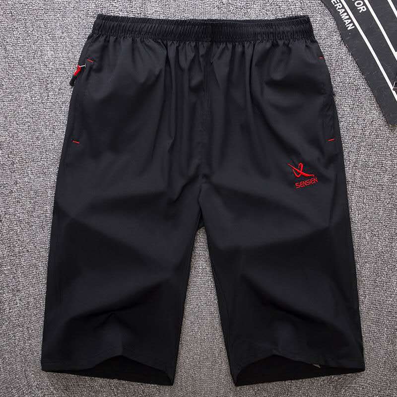 Manufactor wholesale Thin section man black Quick drying shorts Sandy beach Sunscreen Seventh Pants Large Add fertilizer motion Elastic force