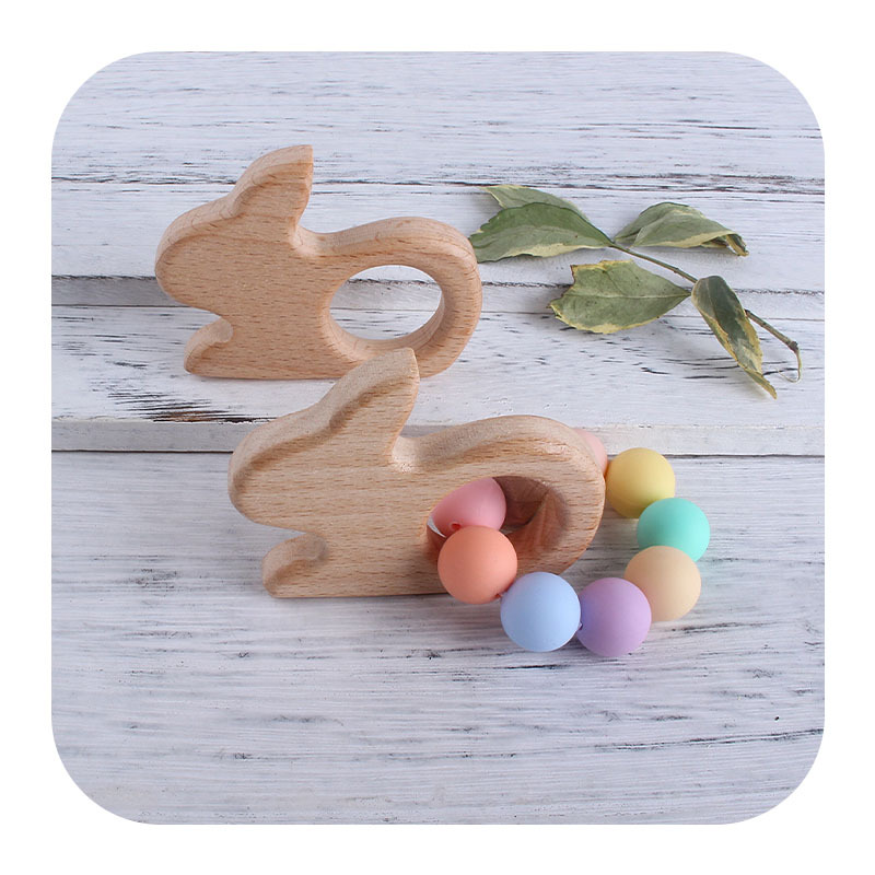 Nuevo bebé conejo haya juguete mordedor bebé molar teether pezón cadena pulsera DIY accesorios de la joyería