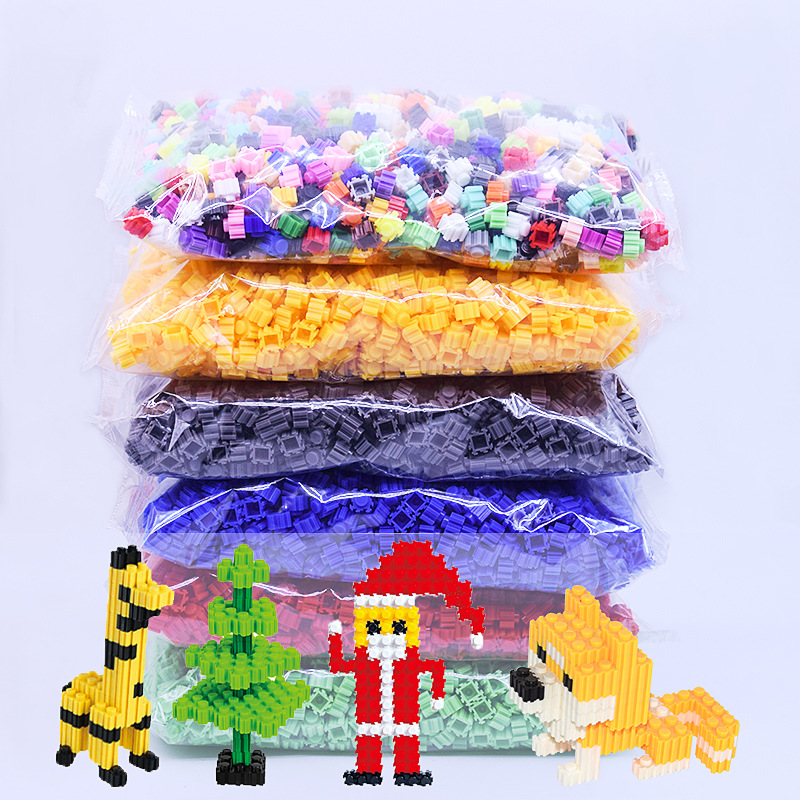Bloques de construcción de la serie de partículas pequeñas que ensamblan juguetes al por mayor incompatibles con rompecabezas de oso Lego rompecabezas tridimensional para niños a granel