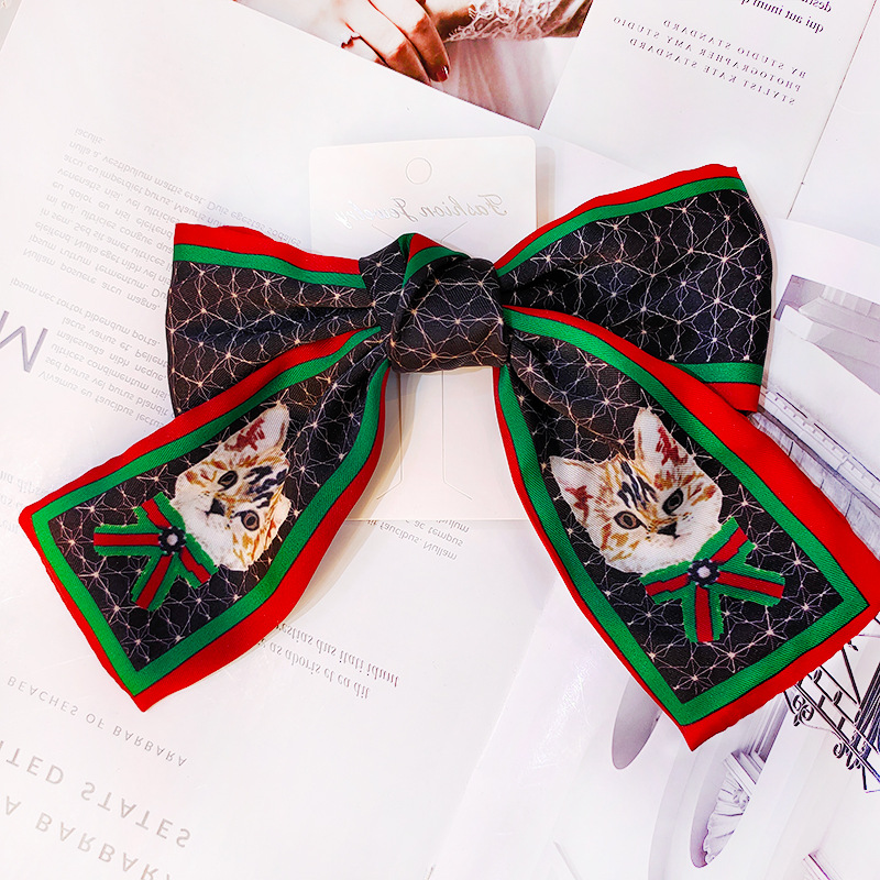 Kitty Coreano Big Bow Hair Band Retro Seda Horquilla Raya Impresión Diadema Venta Al Por Mayor Nihaojewelry display picture 3