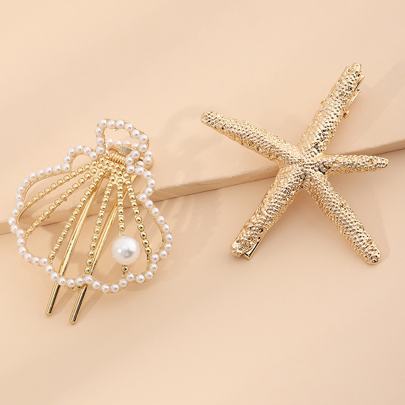 New Beach Hairpin Holiday Golden Starfish Pearl Hollow Small Shell Hairpin Side Clip Wholesale Nihaojewelry display picture 5