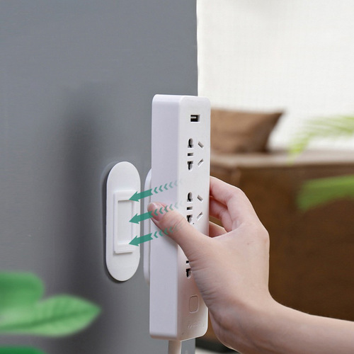 Power strip holder wall-mounted wall-mounted storage power strip punch-free power strip socket hanging wall-adhesive