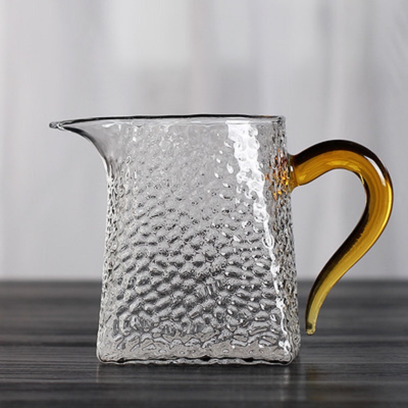 Fábrica engrosada martillo patrón de color mango de vidrio de borosilicato cuadrado justo taza de té Filtro de fuga de té Mar hogar taza pública