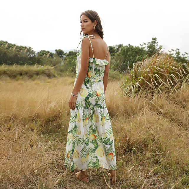 Long dress with halter tie and fruit print